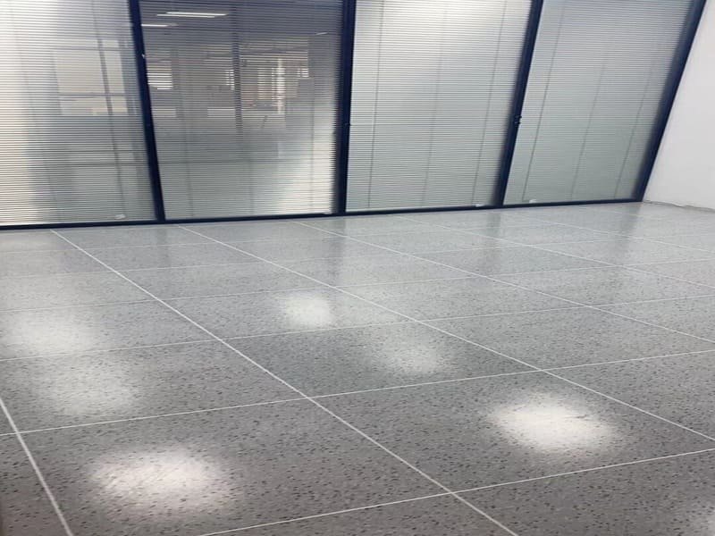 copper grounding strip under ESD vinyl flooring